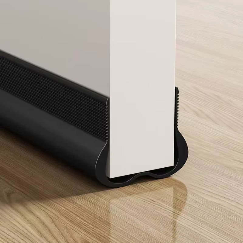 Bande d'étanchéité souple en PVC pour bas de porte