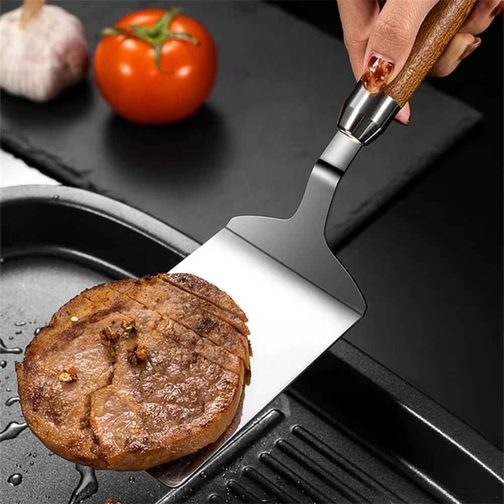 Spatule en acier inoxydable avec manche en bois