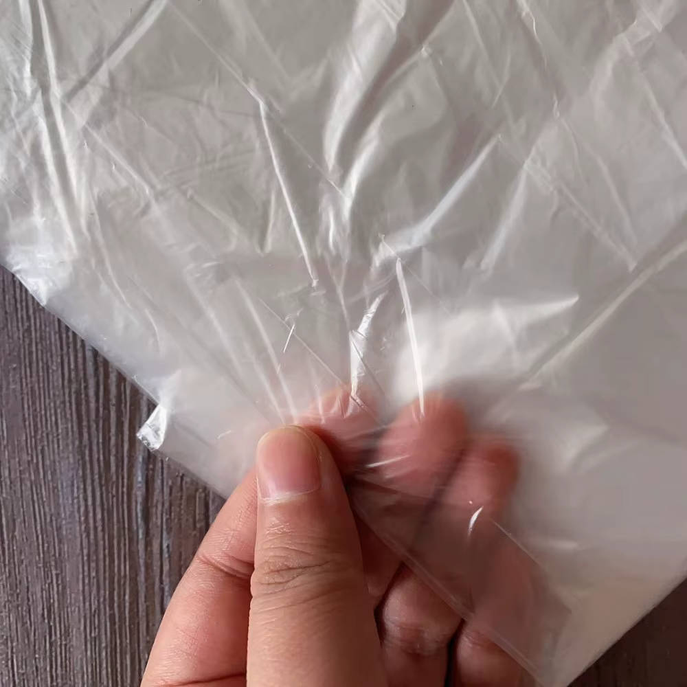 Film de protection transparent anti-poussière pour meubles
