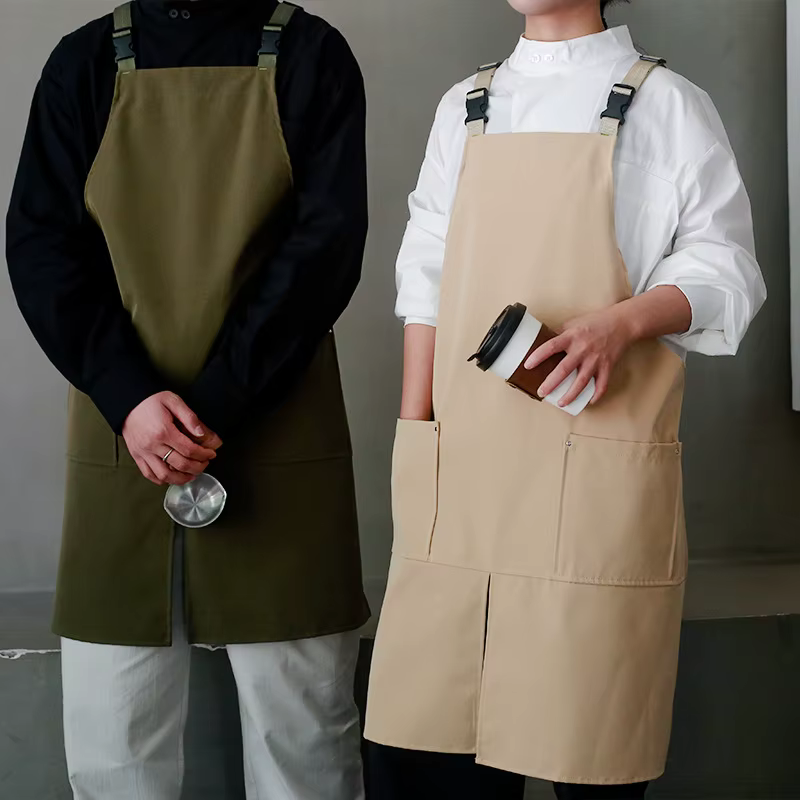 Tablier de logo personnalisé avec le coton imperméable de toile de conception divisée pour la cuisine de restaurant de café