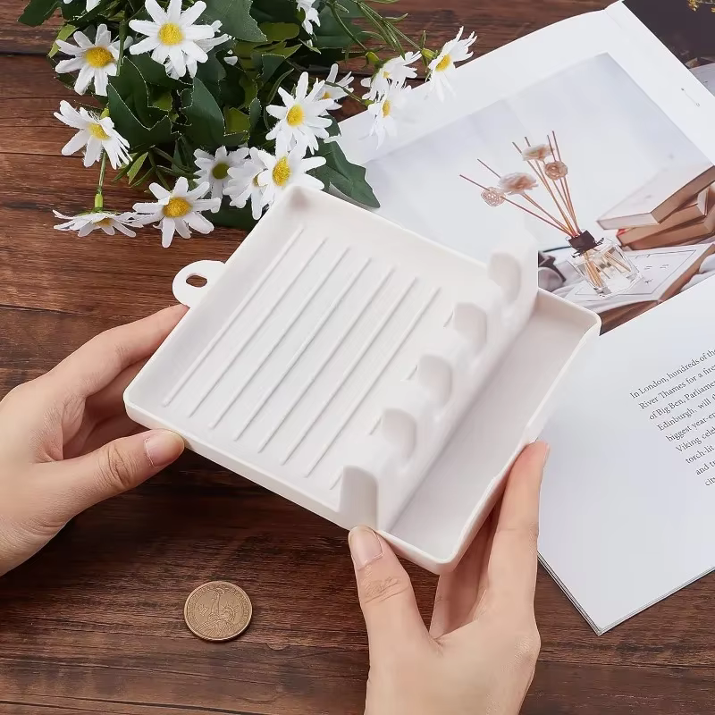Support de repose-pinceau en plastique blanc