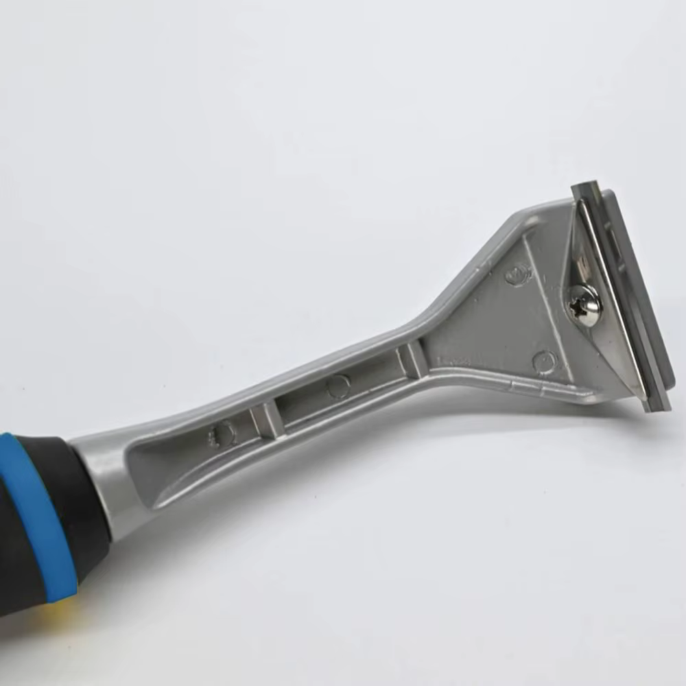 Grattoir de dissolvant de colle efficace pour l'élimination de la peinture